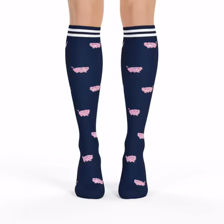 Stödstrumpa mörkblå med rosa grisar