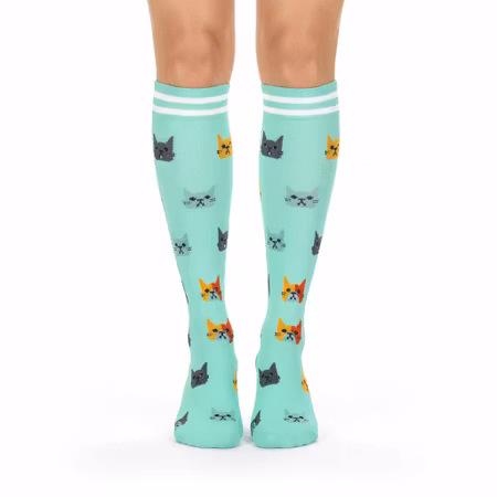 Stödstrumpa turkos med katter