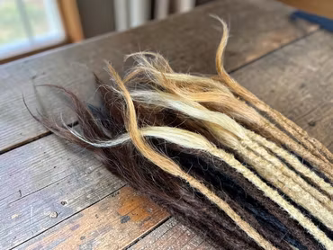 Lösa dreadlocks i äkta hår