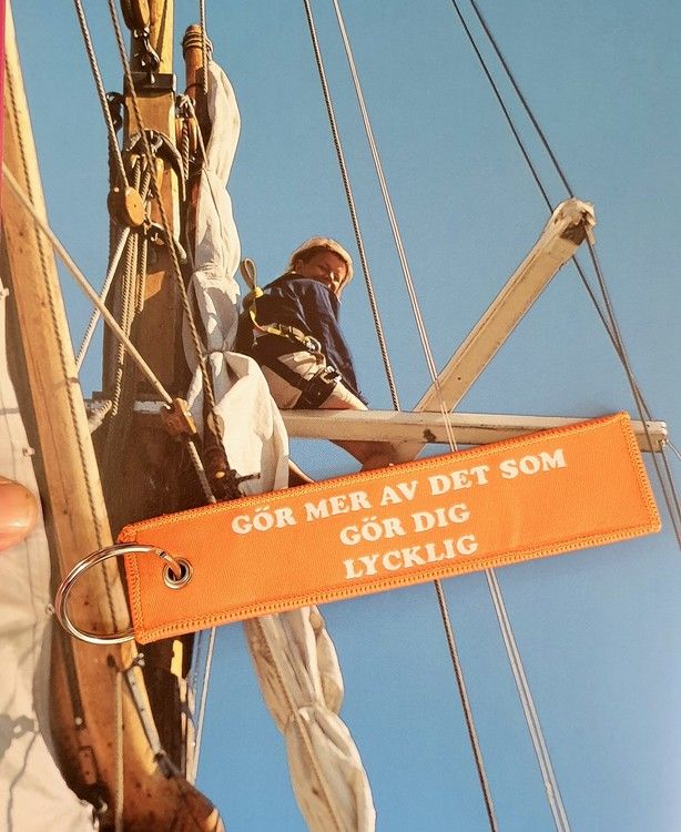 Gör mer av det som gör dig lycklig  Nyckelring/tag
