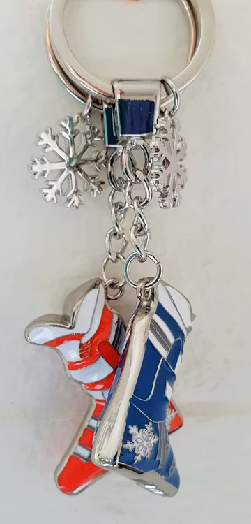 Alpinpjäxa röd med snöflinga