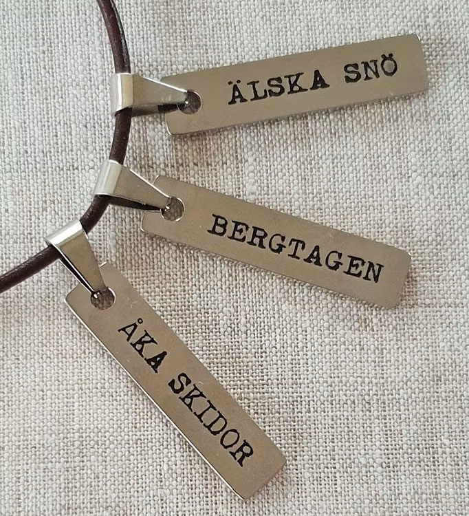 Bergtagen berlock med läderband