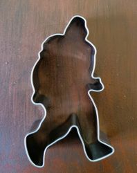 Vandrare med ryggsäck pepparkaksform