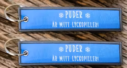 Puder är mitt lyckopiller! Nyckelring/Tag