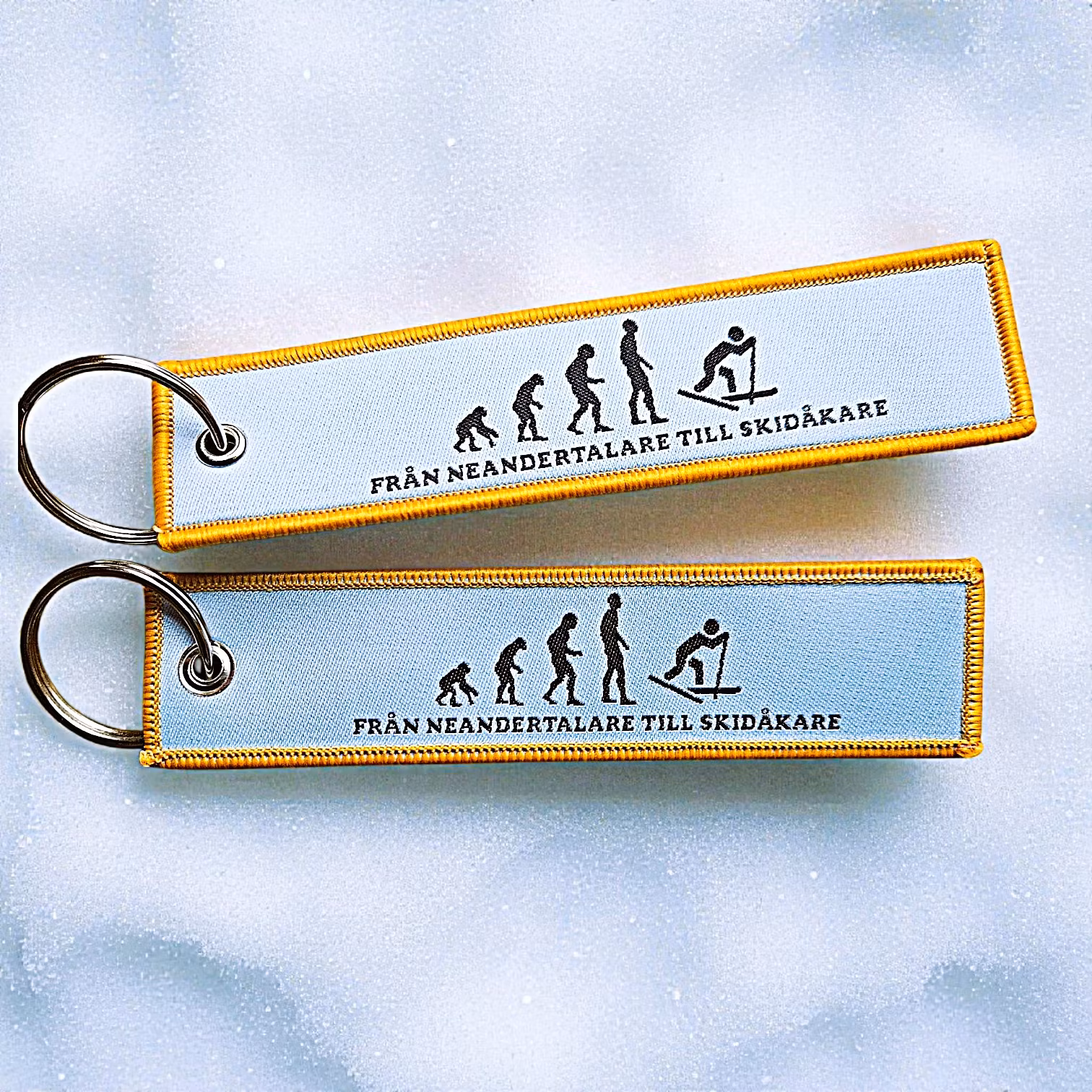 Från Neandertalare till skidåkare - Nyckelring/tag