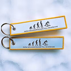 Från Neandertalare till skidåkare - Nyckelring/tag