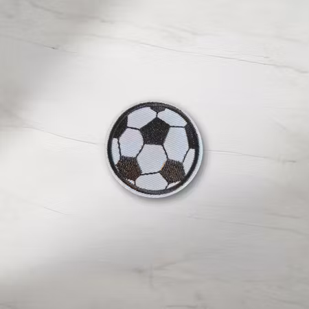 Fotboll tygmärke