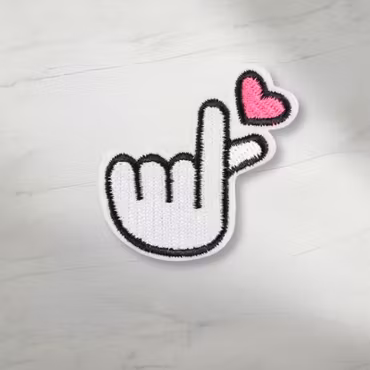 Finger heart tygmärke
