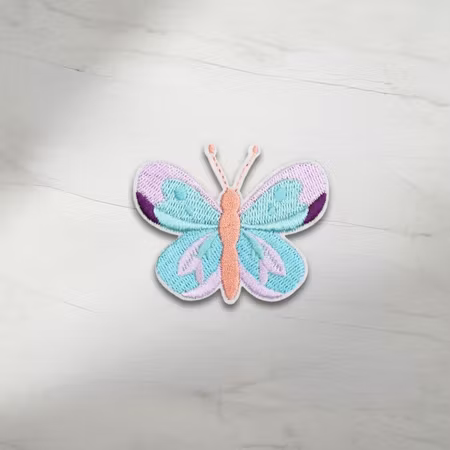 Vacker Fjäril i pastellfärger