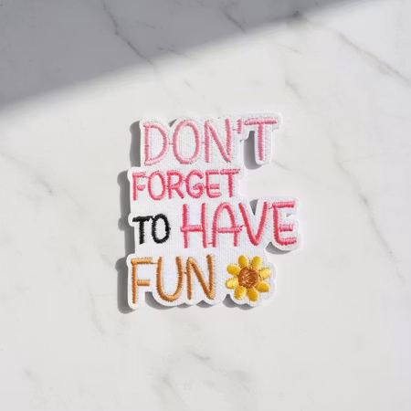 Don’t forget to have fun tygmärke