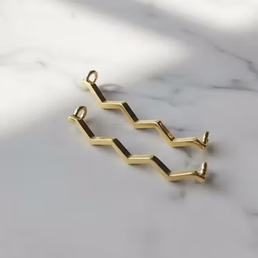 Skosmycke Wave - Guld (säljs parvis)