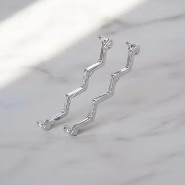 Skosmycke Wave - Silver (säljs parvis)