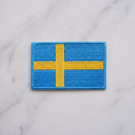 Tygmärke Sveriges flagga – broderat strykmärke