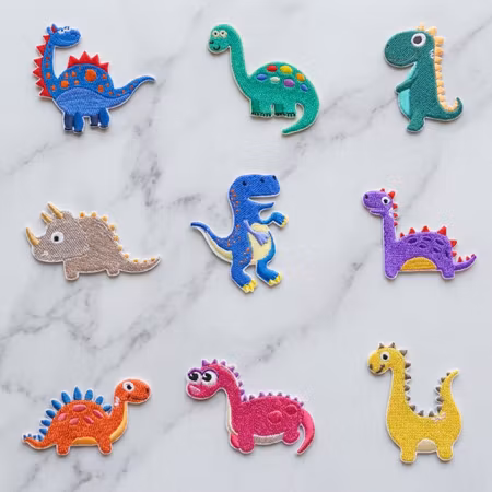 Självhäftande tygmärken Dinosaurier 9-pack – broderade märken
