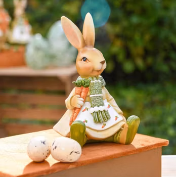 Kaninjente sitter med gulrot - 13 cm