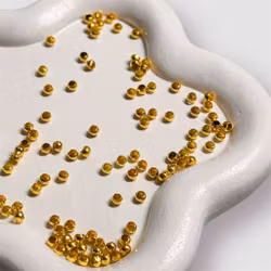Klämpärlor GULD ca 100st