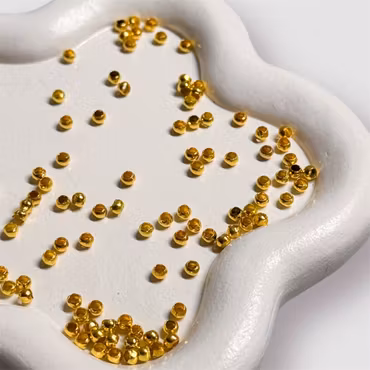 Klämpärlor GULD ca 100st