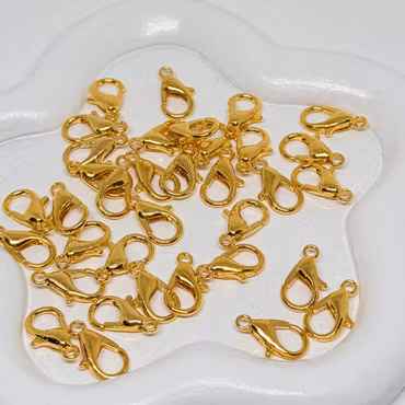 Klolås Rostfritt stål 12mm Guld 20st