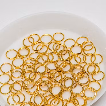 Bindringar 6mm Guld ca 100st