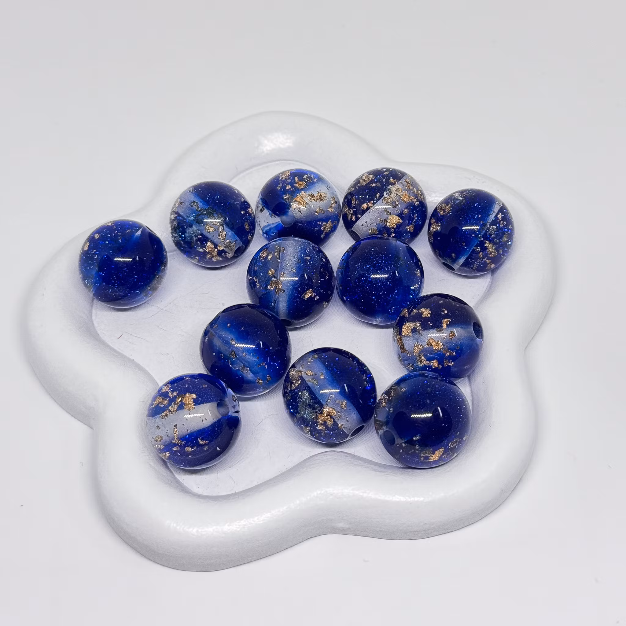 16mm Glitter/gold flakes Mörkblå 1st