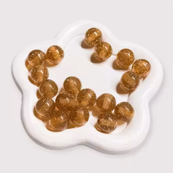 12mm Glitterpärlor Guld 1st