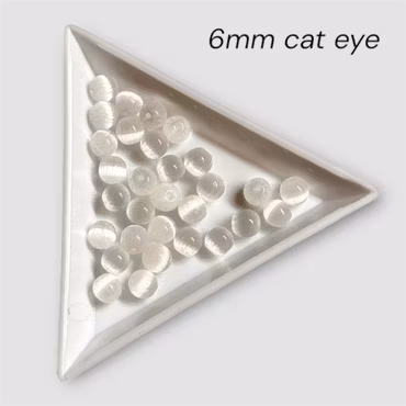 6mm cat eye glaspärlor Vit 50st
