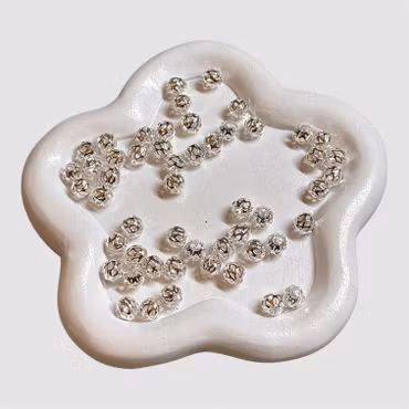 6mm mellandel "cage" silver 50st