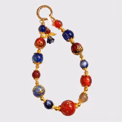 Väsksmycke röd/blå 1st