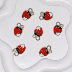 Jordgubbsberlock metall silver bak 1st