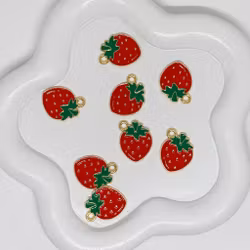 Jordgubbsberlock metall guld bak 1st