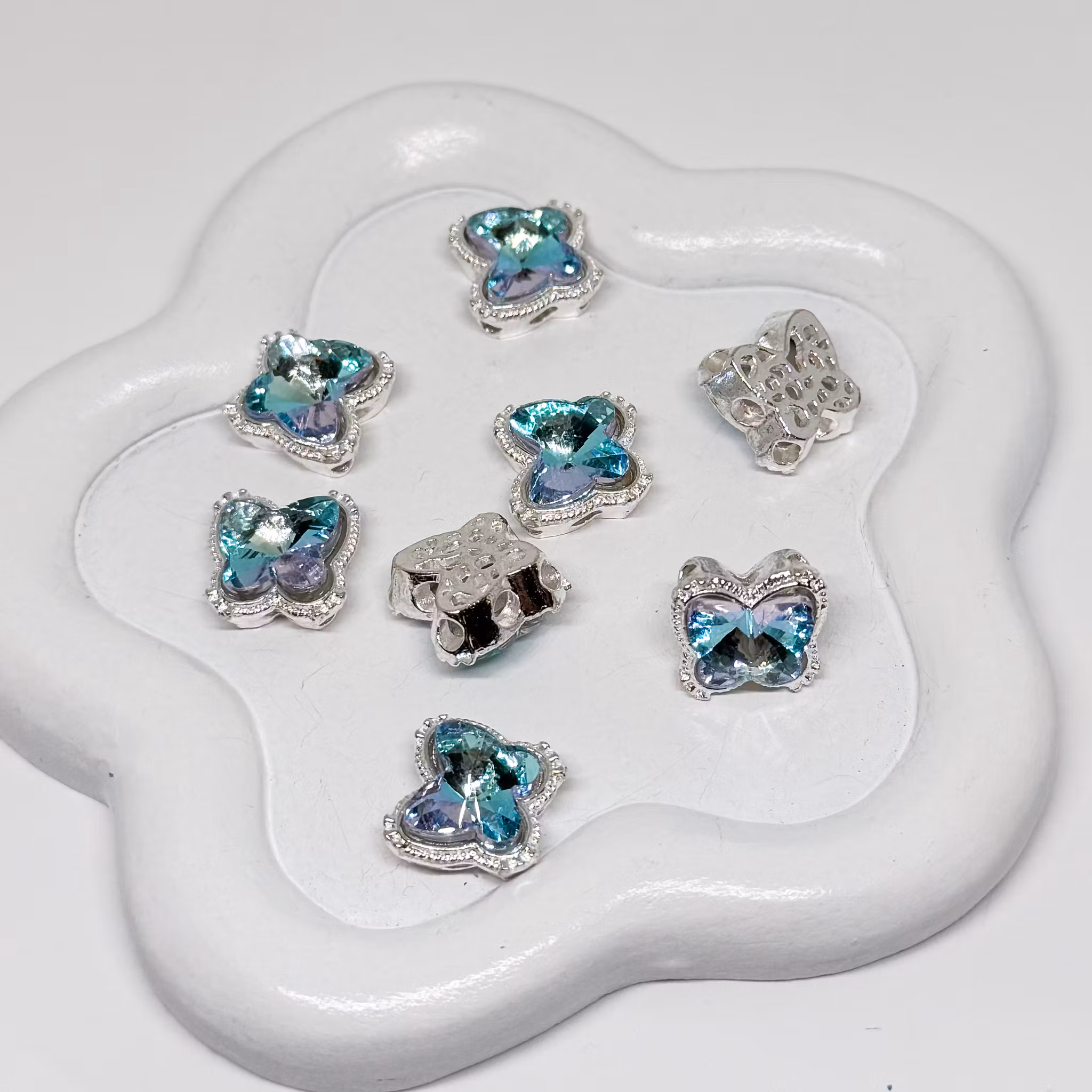 Fjäril multihål "8 hål" Turkos AB 1st