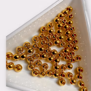 4mm Mellandelar plast guld ca 200st