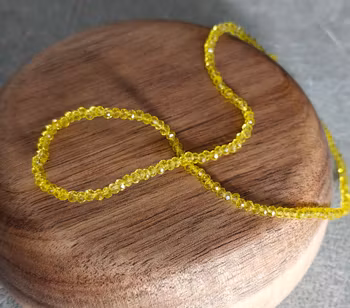 Glaspärlor facetterade - bright yellow 1 mm