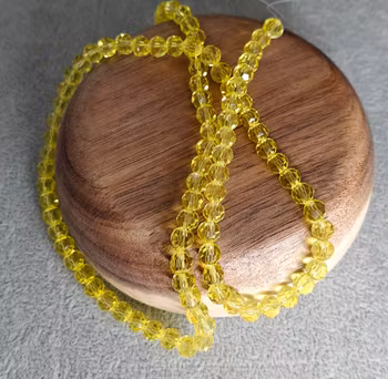 Glaspärlor facetterade - citrongula 6 mm