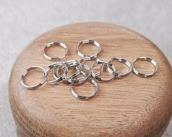 Dubbla bindringar silverfärgade - 10 mm