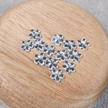 Rhinestones blommor - silverfärgade 7 mm