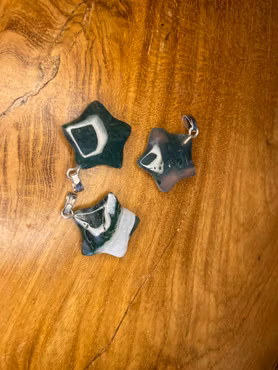 En stjärnformad berlock av Mossagat