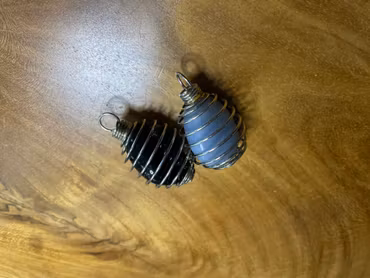 Liten bur för kristall