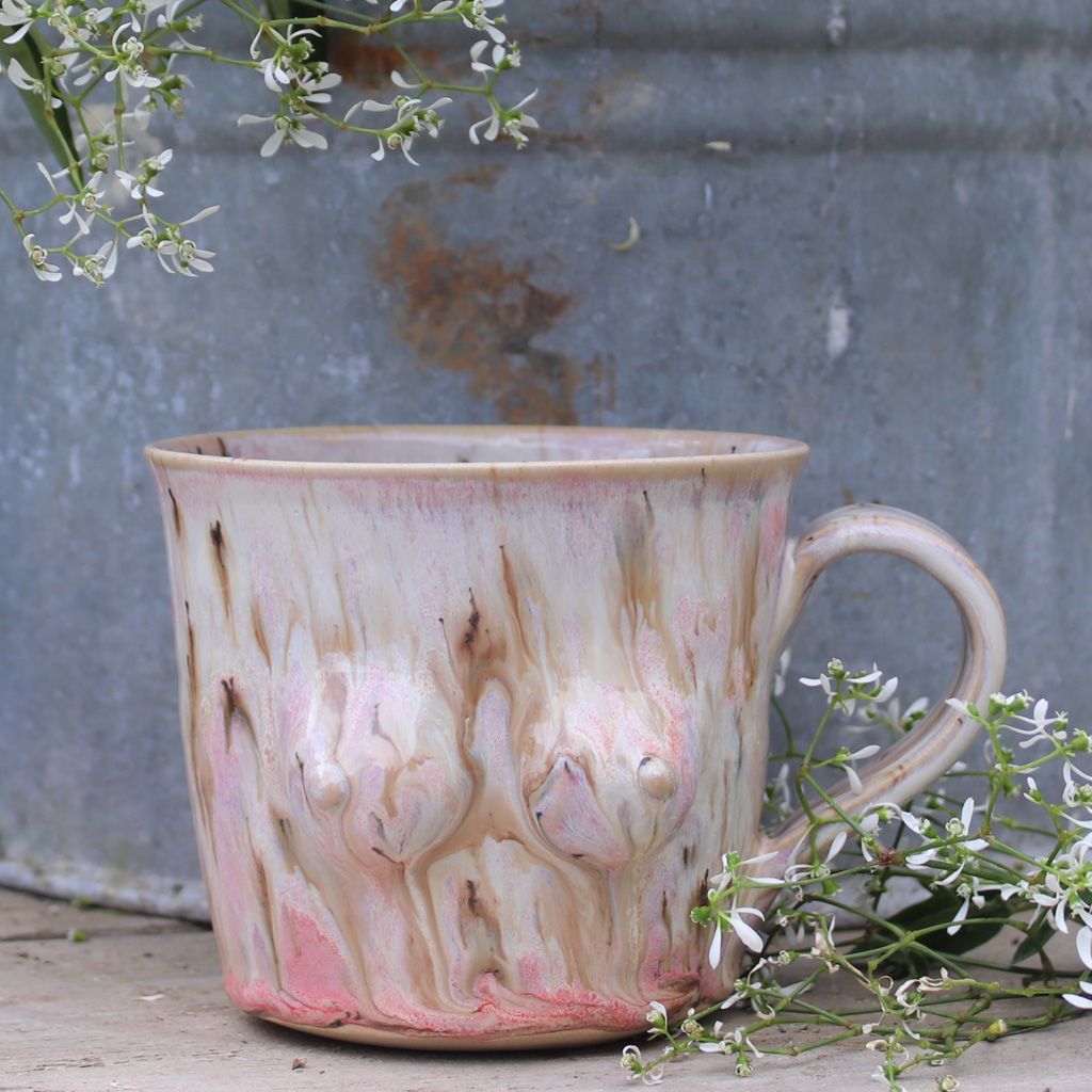 Bröstkoppen, rosa med vitt