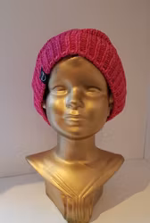 Rosa melerad mössa La Tuque från Kombi-