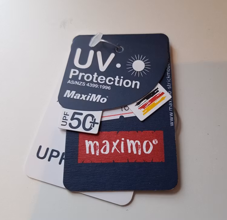 Söt blommig mössa med UV 50+ från MaxiMo-