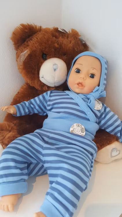Blå prematur-mössa för de minsta. Fixoni little bee.