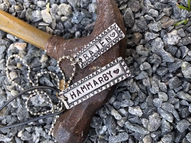 Tennberlock handstansad