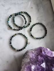 Armband i mossagat med Lotusblomma i äkta silver