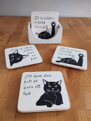 Glasunderlägg med lite bevingade ord. 😽