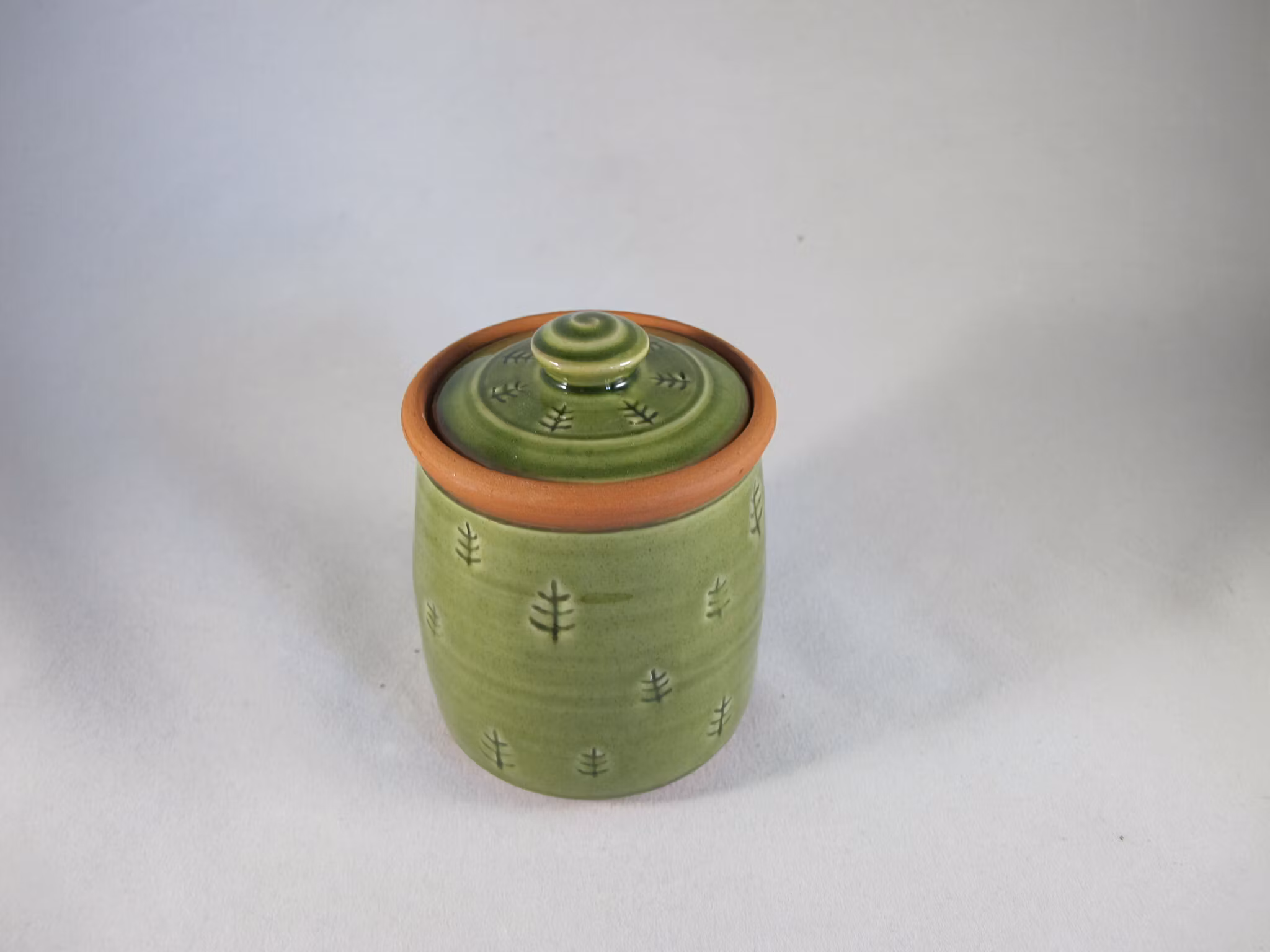 Liten burk med granmönster