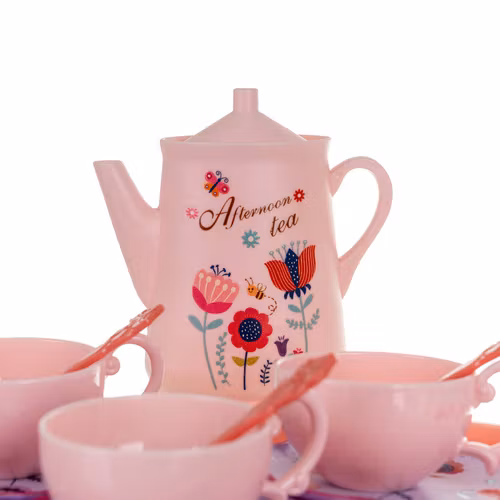 Teservis för flickor i resväska med kakor och koppar