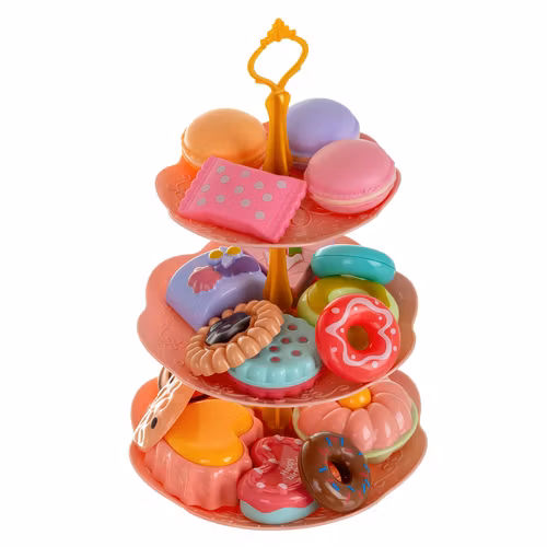 Teservis för flickor i resväska med kakor och koppar