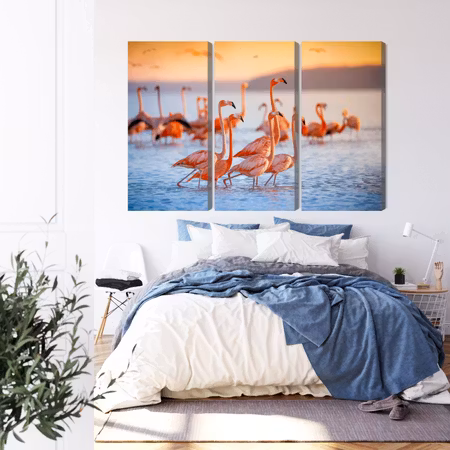 Canvastavla - A flock of flamingos by the water