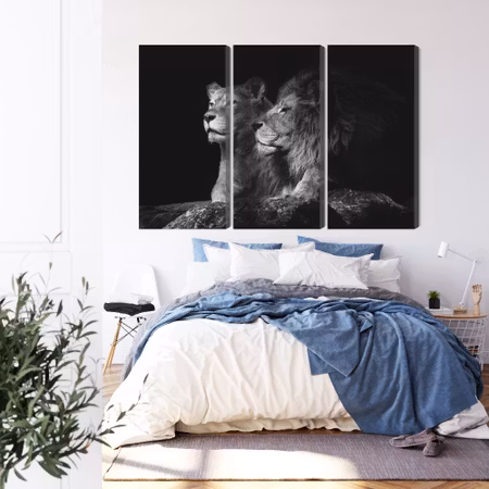 Canvastavla - Lion and lioness on a black background